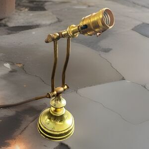 A vintage Stiffel Solid Brass Table Lamp With Swing Arm